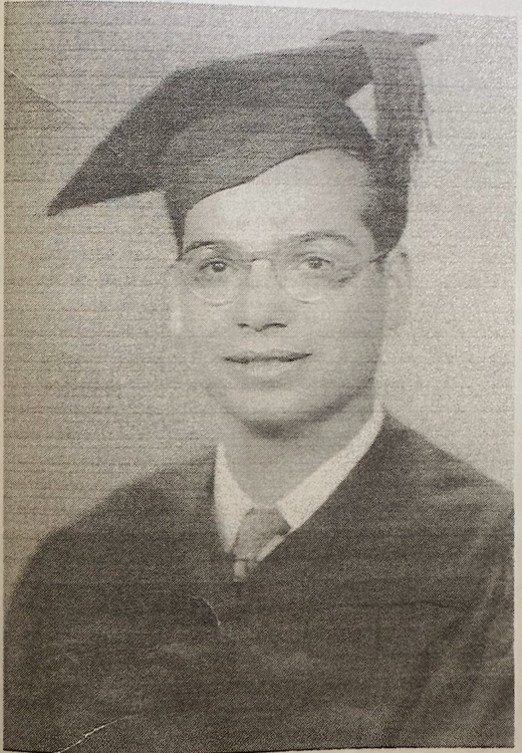 Young man in graduation cap and gown